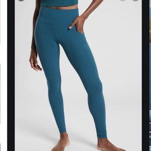 Athleta Salutation Stash Pocket tights 7/8 length, sz PS, teal